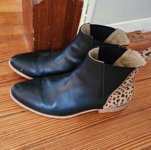 Sseko Women's Black Leather Chelsea Boots with Tan Leopard Heel Accent